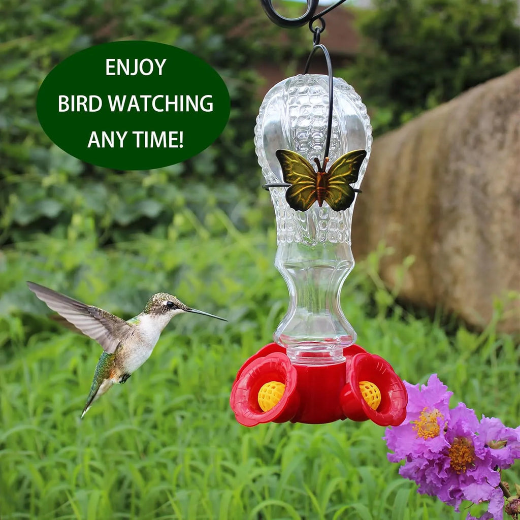 Comedero de colibrí de vidrio con flores y foso para hormigas